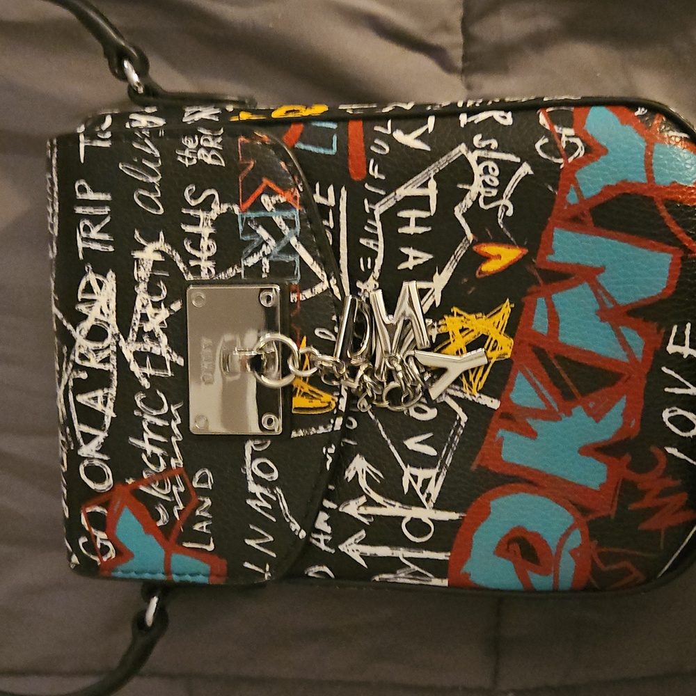 DKNY Black and Multicolor Graffiti Crossbody Bag. Magnetic Close